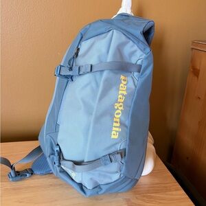 Patagonia Light Blue Backpack with Yellow Accents